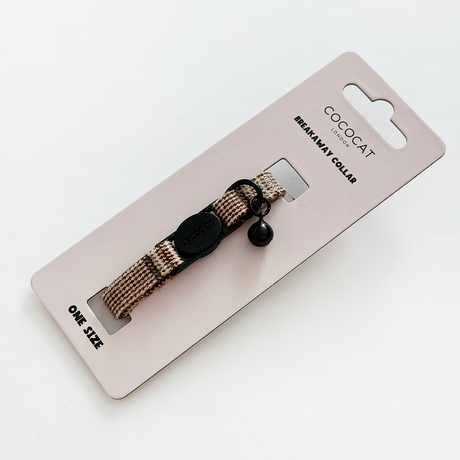 Cat collar on a packaging card with 'Cococat' branding on a light background