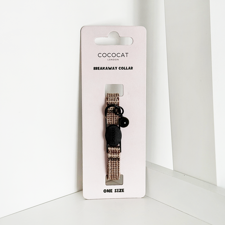 Cococat cat collar on a white card with a white background