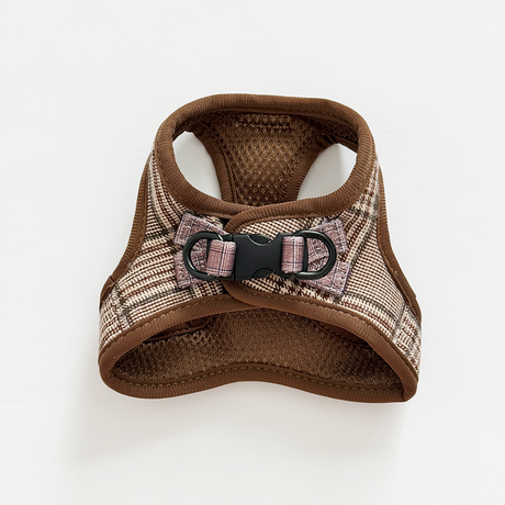 Brown and plaid patterned dog harness on a white background