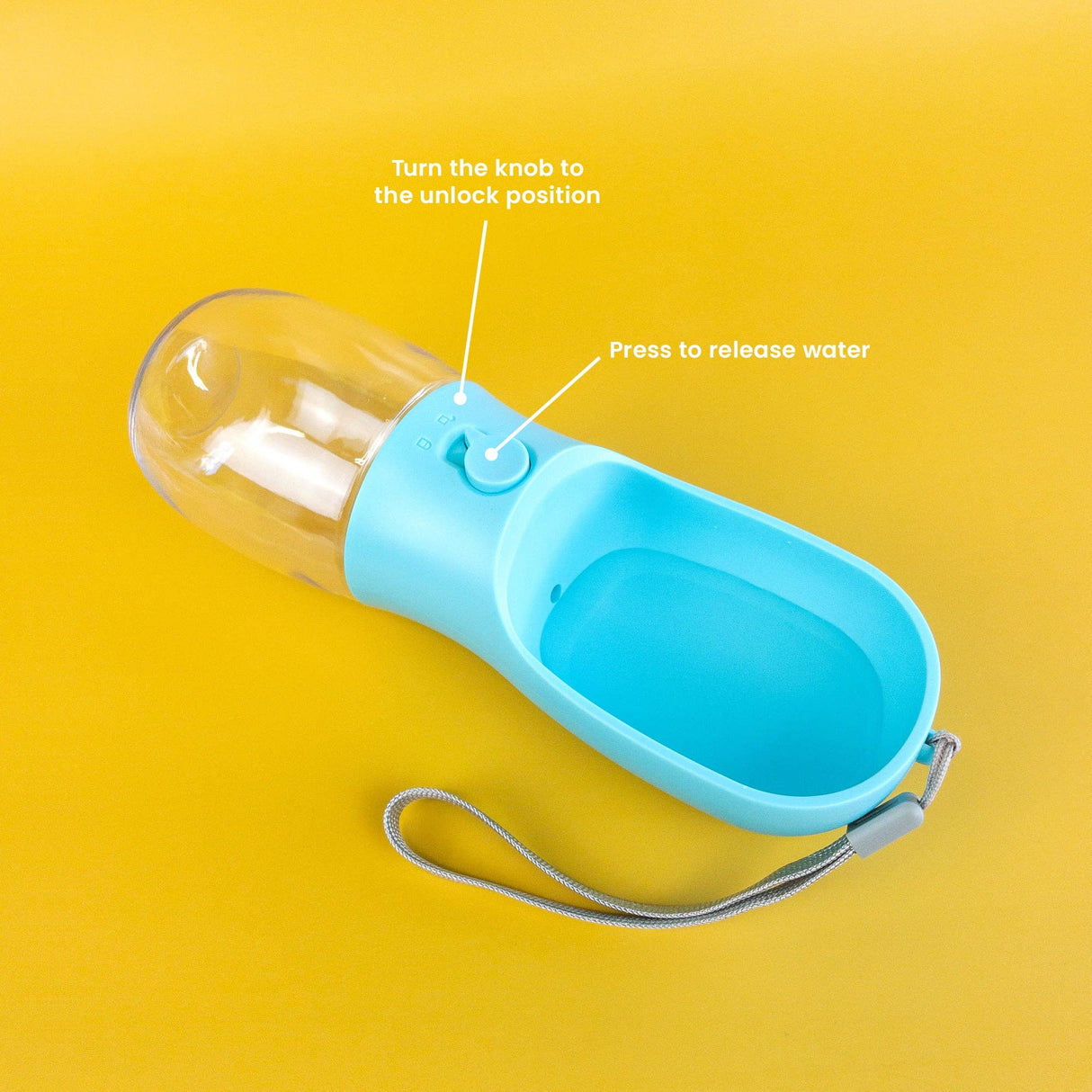 Portable pet water bottle with instructions on a yellow background