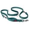 A green Halti Anatomy Multi Lead for dogs, featuring a double-ended design with a bungee element, reflective stripes, and neoprene padding.