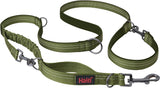 A green Halti dog leash with a double-ended design and a bungee element, featuring a clip at each end and neoprene padding.